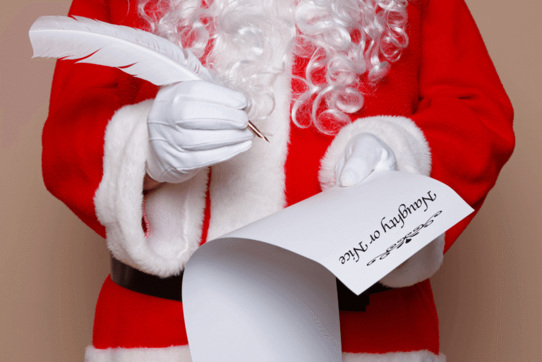 Santa holding a list titled ‘Naughty or Nice’