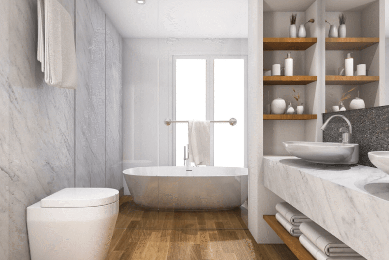 Neutral bathroom interior with grey and white fixtures, wood accents, and timber-look flooring.