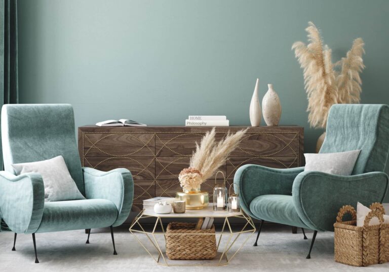 Living room with neutral carpet and mid-century inspired furnishing.
