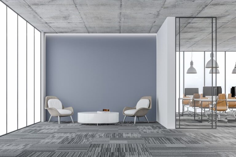 Office interior featuring modular commercial carpet tiles in a neutral colour palette.