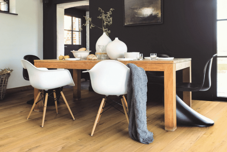 Dining room with laminate timber flooring and modern wooden table