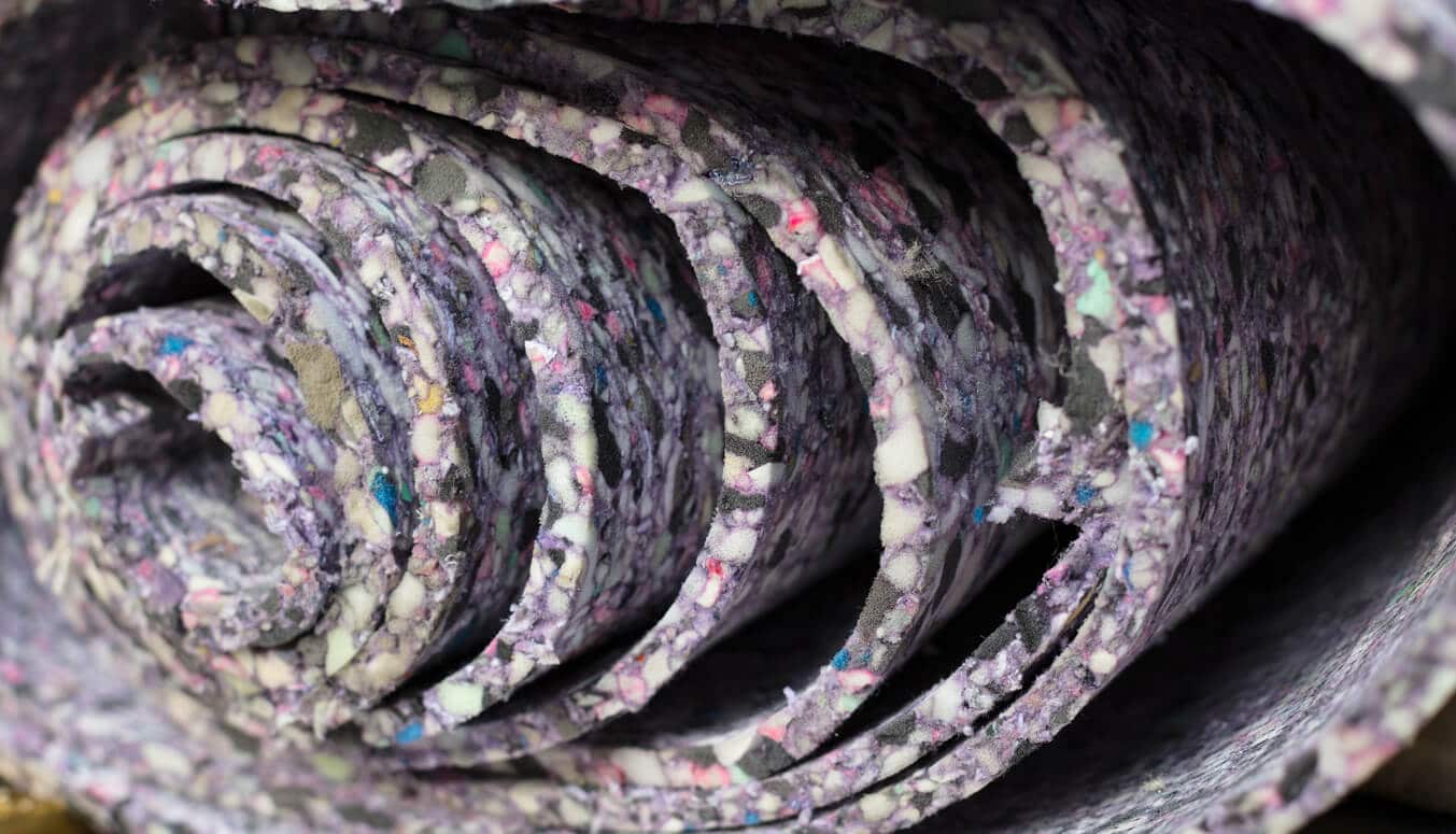 Rolled carpet underlay material