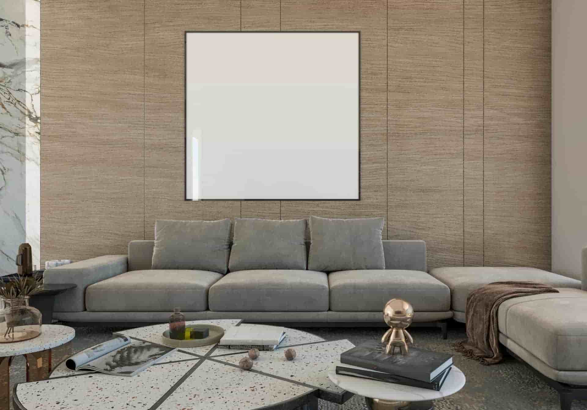 A living room showing laminate wall panels installed behind seating.