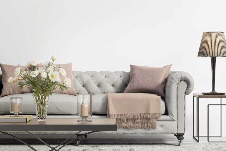 A living room featuring neutral furniture, decor & flooring